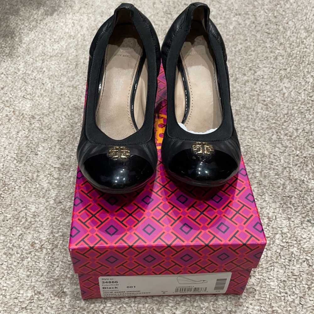 Black Tory Burch wedge shoes.